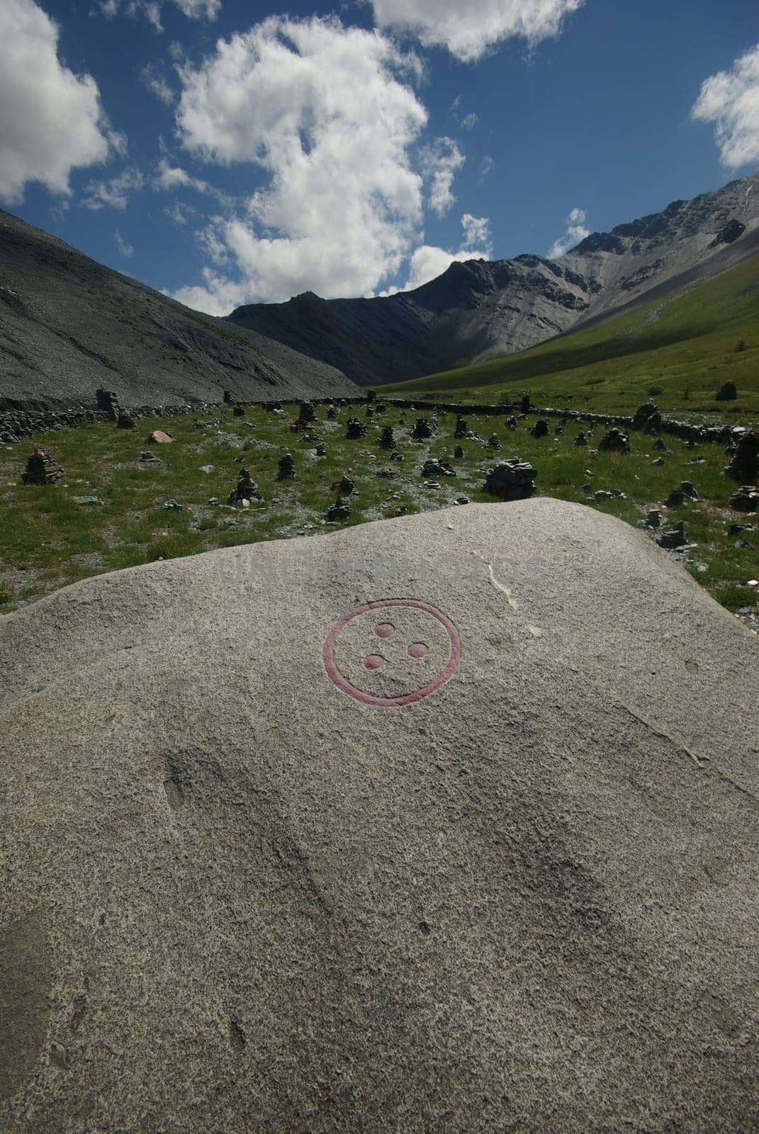 Mountain landscape. Highlands, the mountain peaks, gorges and valleys. The stones on the slopes.
