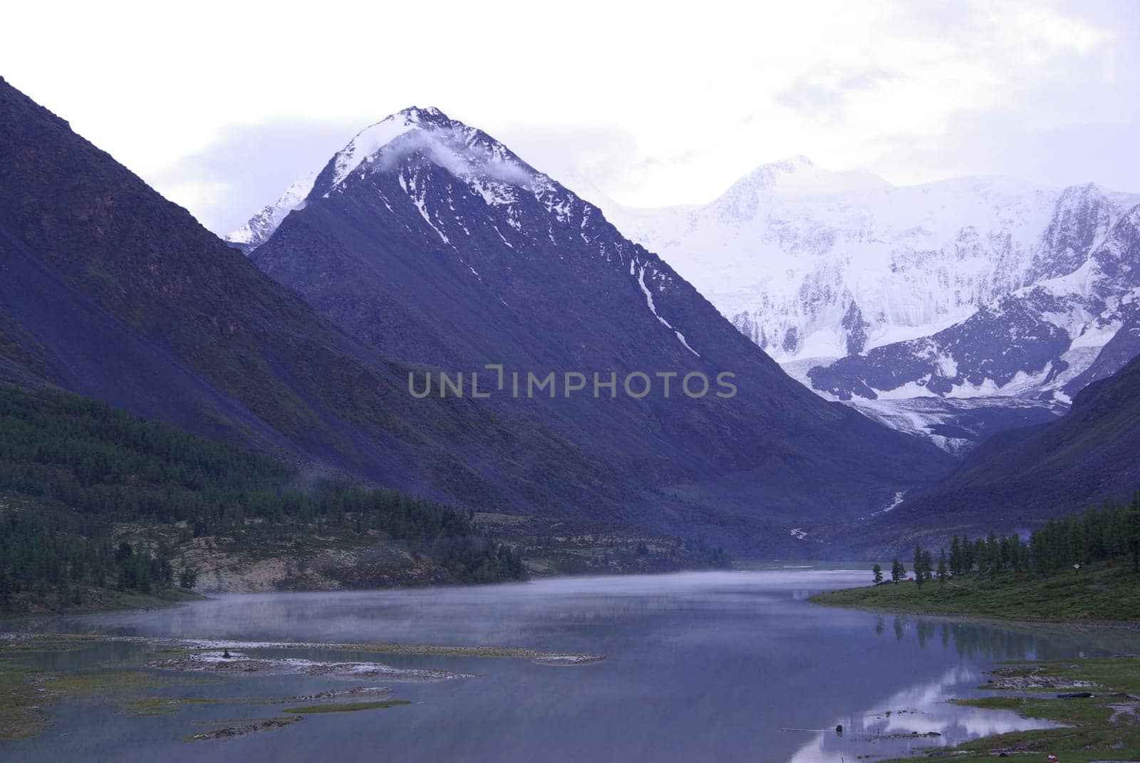 Mountain landscape. Highlands, the mountain peaks, gorges and valleys. The stones on the slopes.
