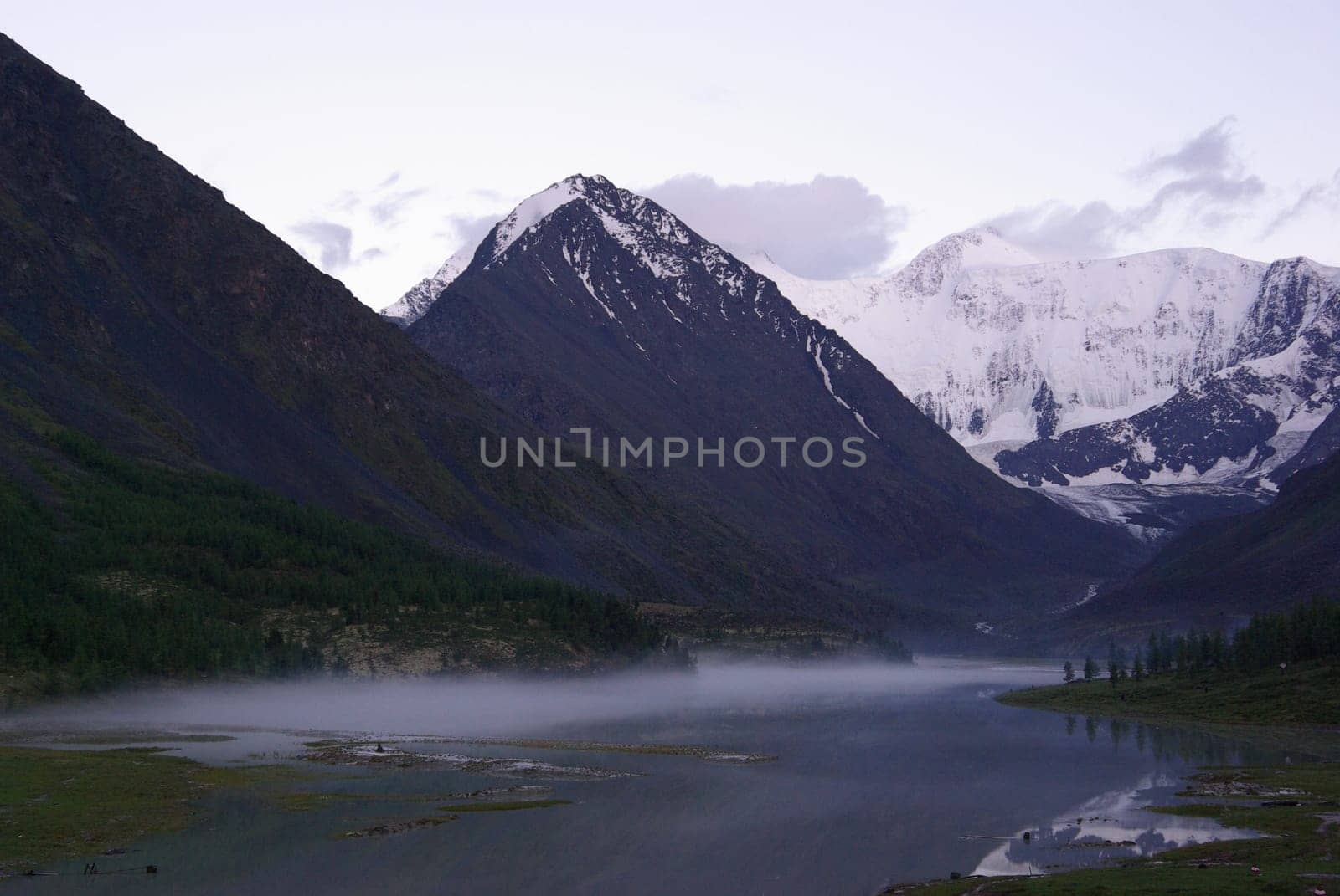 Mountain landscape. Highlands, the mountain peaks, gorges and valleys. The stones on the slopes.