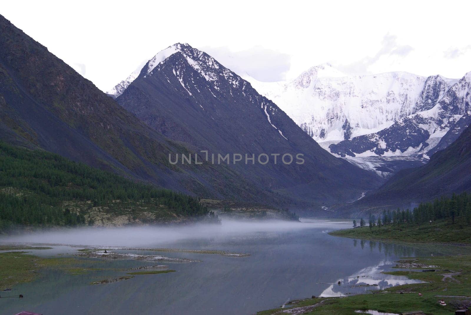 Mountain landscape. Highlands, the mountain peaks, gorges and valleys. The stones on the slopes.