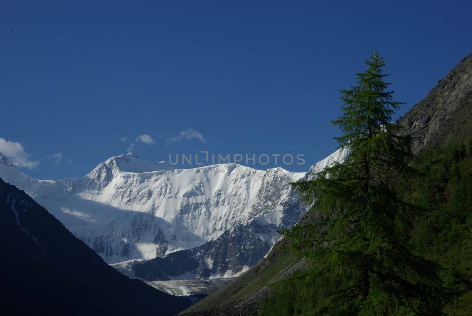Mountain landscape. Highlands, the mountain peaks, gorges and valleys. The stones on the slopes.
