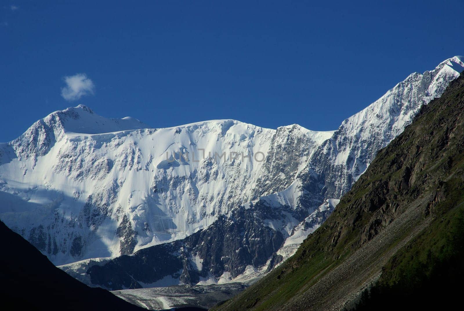 Mountain landscape. Highlands, the mountain peaks, gorges and valleys. The stones on the slopes.