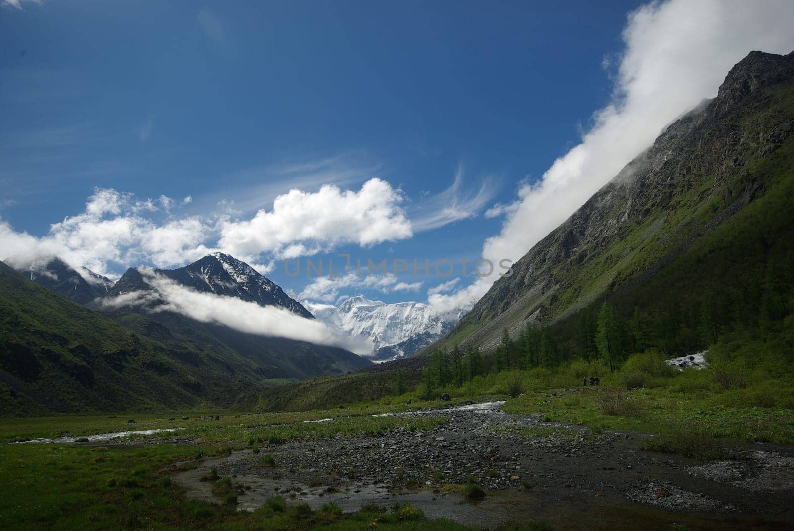 Mountain landscape. Highlands, the mountain peaks, gorges and valleys. The stones on the slopes.