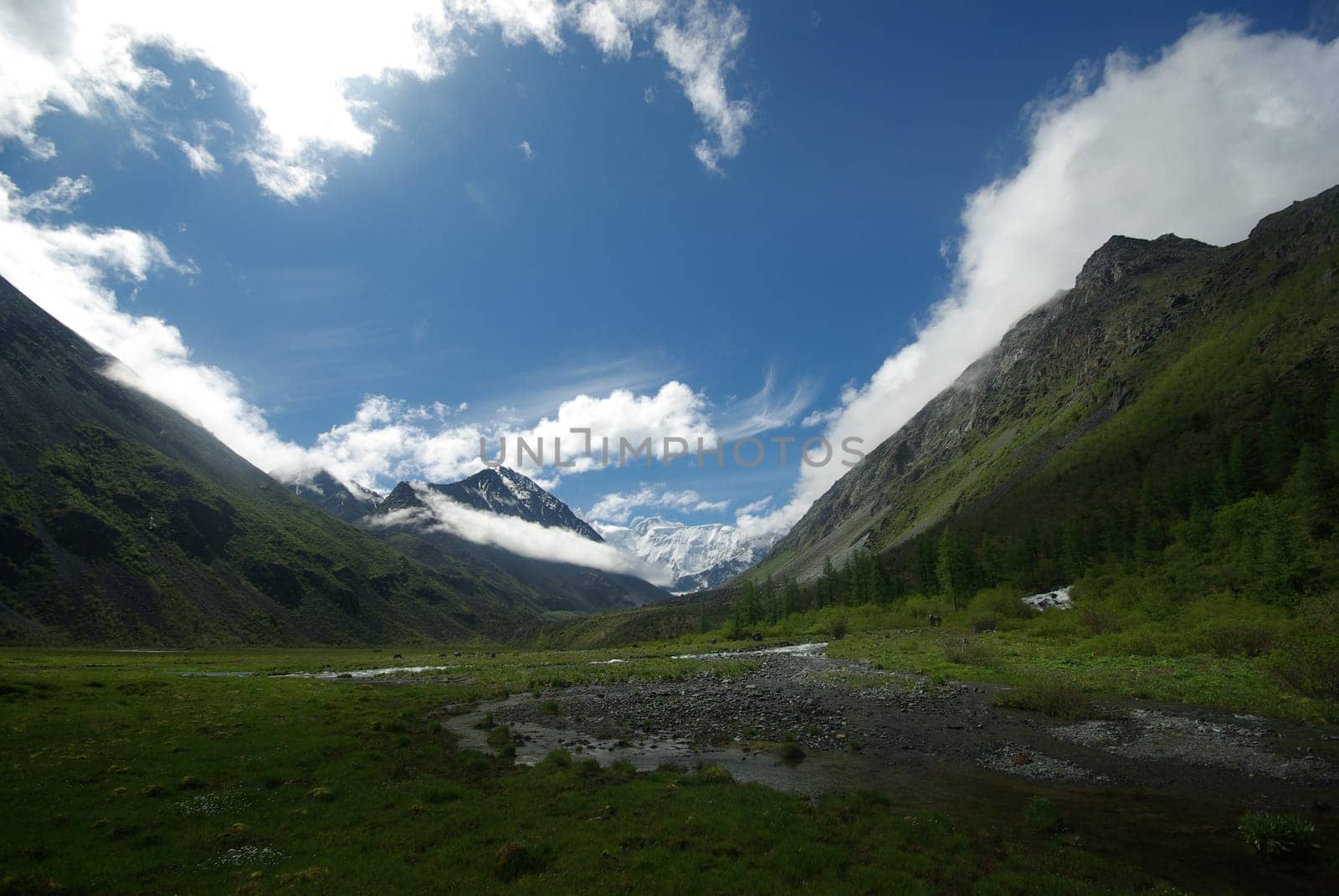 Mountain landscape. Highlands, the mountain peaks, gorges and valleys. The stones on the slopes.