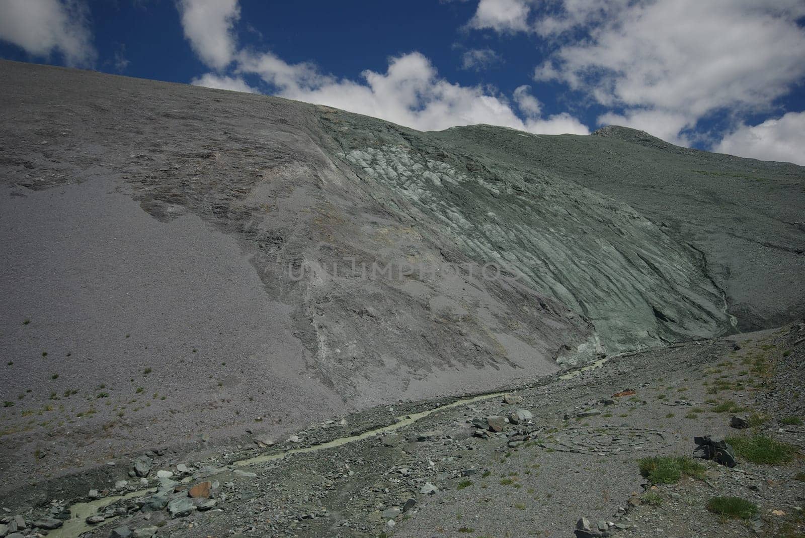 Mountain landscape. Highlands, the mountain peaks, gorges and valleys. The stones on the slopes.