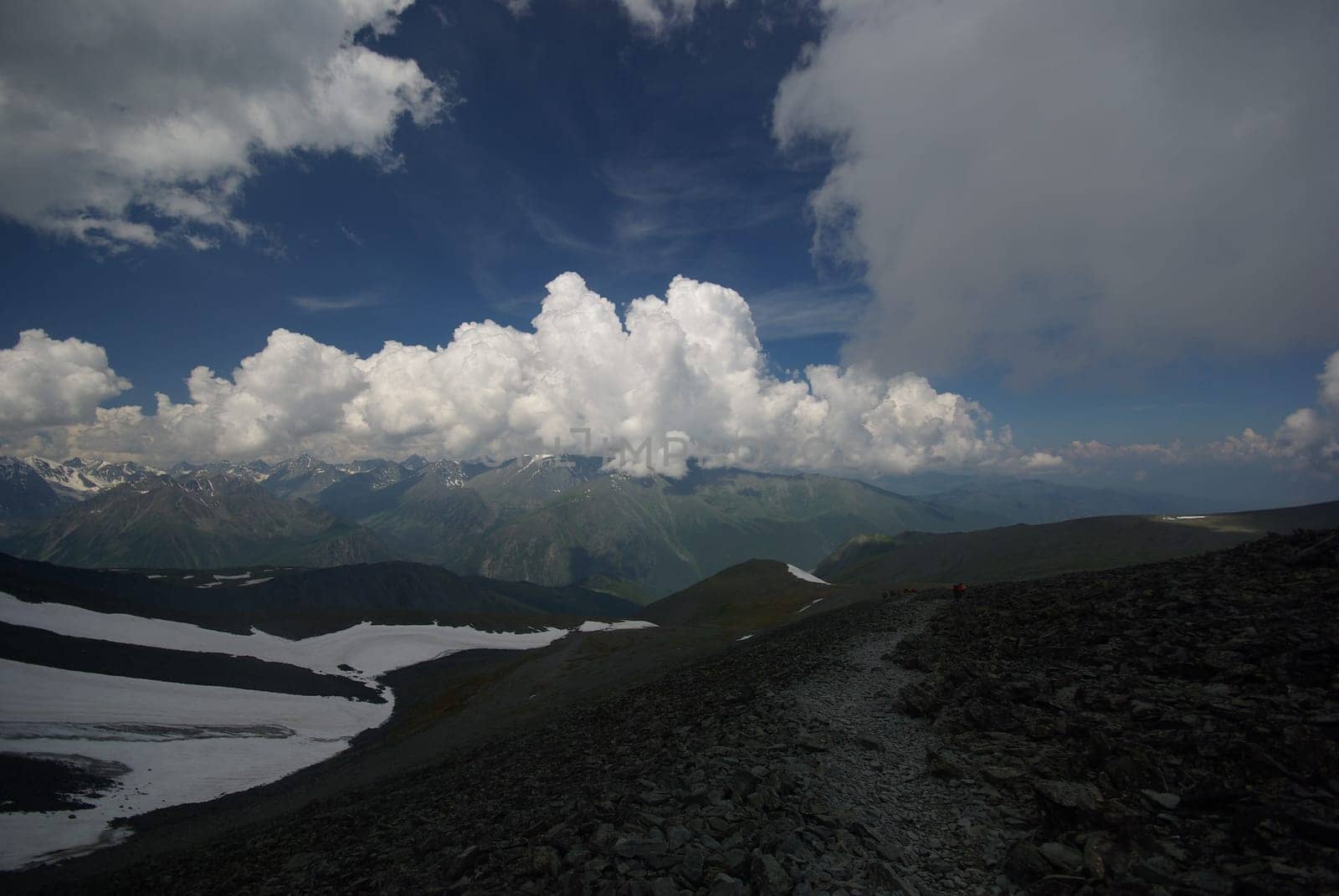 Mountain landscape. Highlands, the mountain peaks, gorges and valleys. The stones on the slopes.
