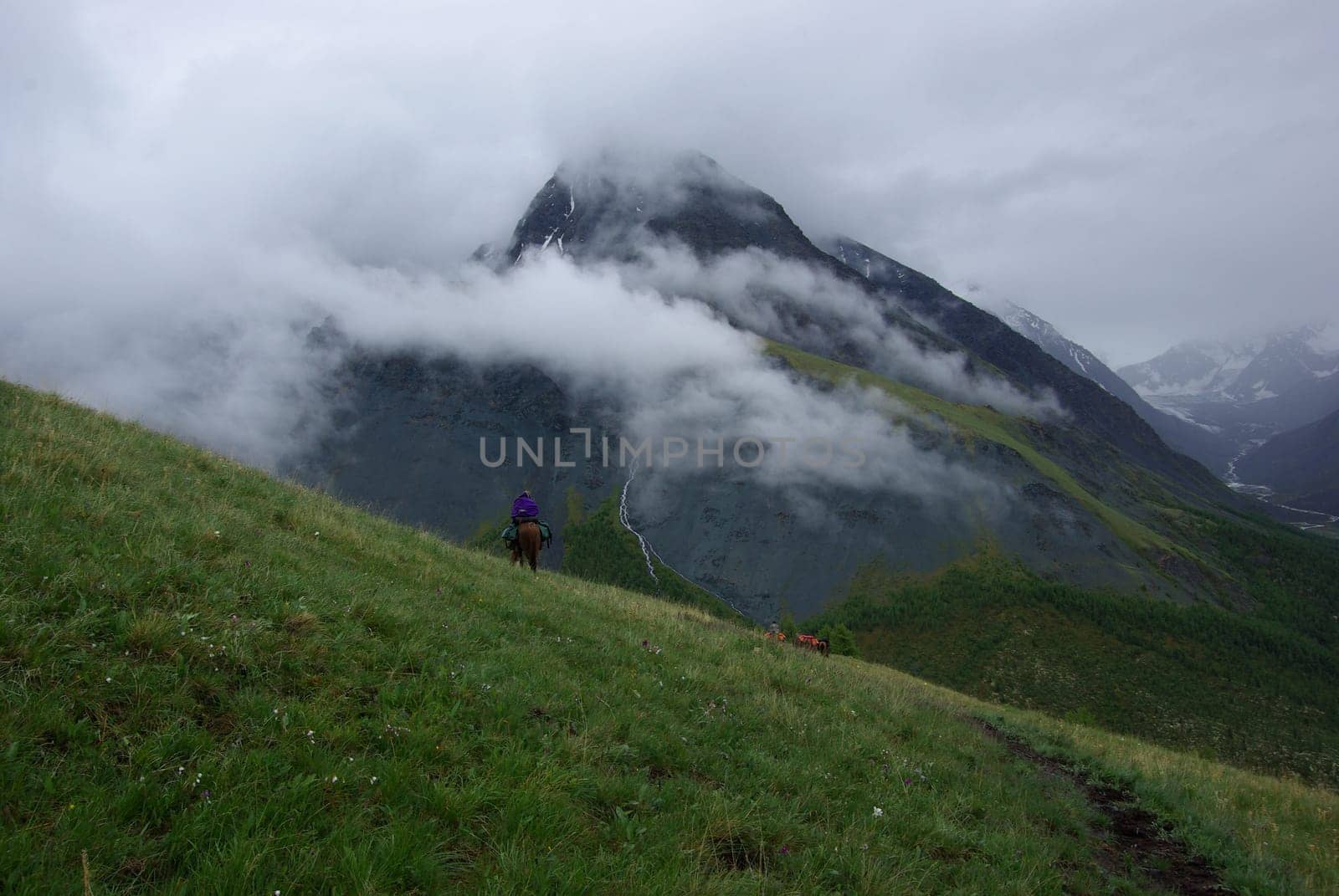Mountain landscape. Highlands, the mountain peaks, gorges and valleys. The stones on the slopes.