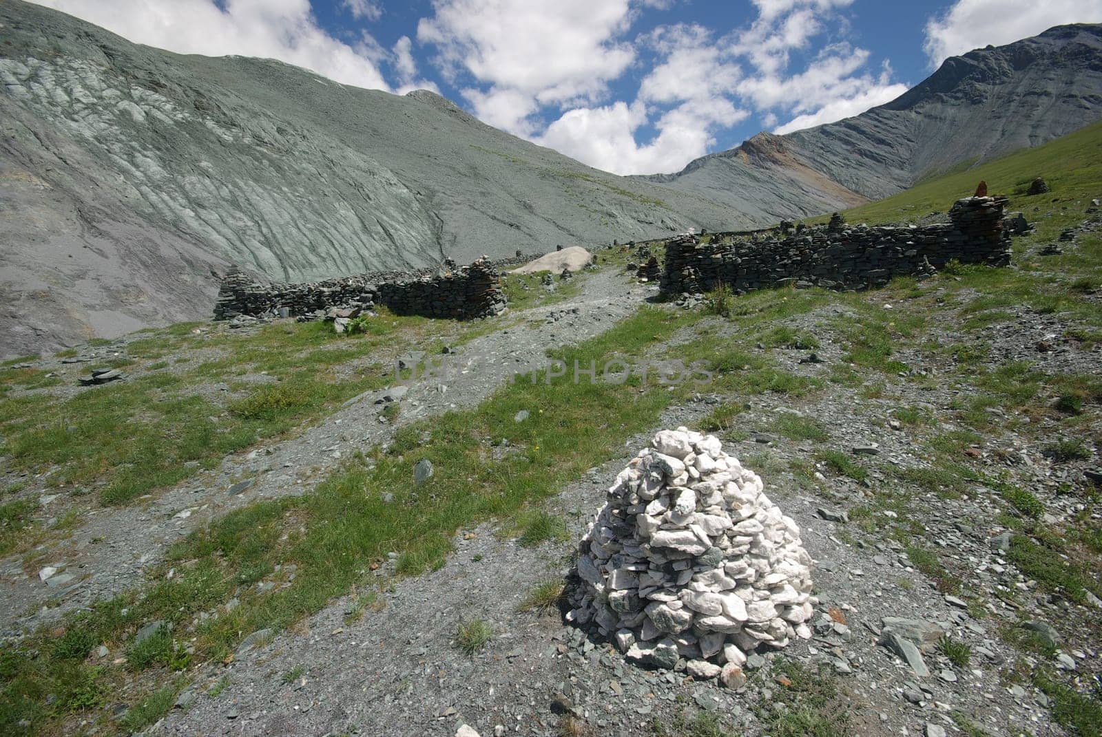 Mountain landscape. Highlands, the mountain peaks, gorges and valleys. The stones on the slopes.