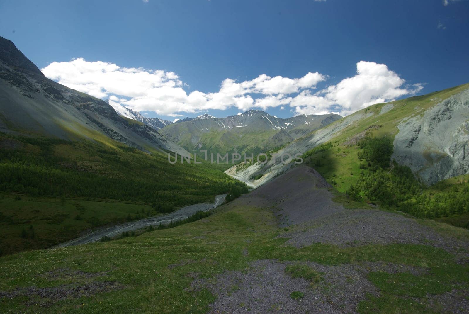 Mountain landscape. Highlands, the mountain peaks, gorges and valleys. The stones on the slopes.