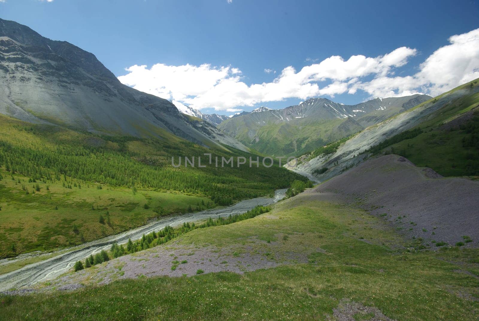 Mountain landscape. Highlands, the mountain peaks, gorges and valleys. The stones on the slopes.