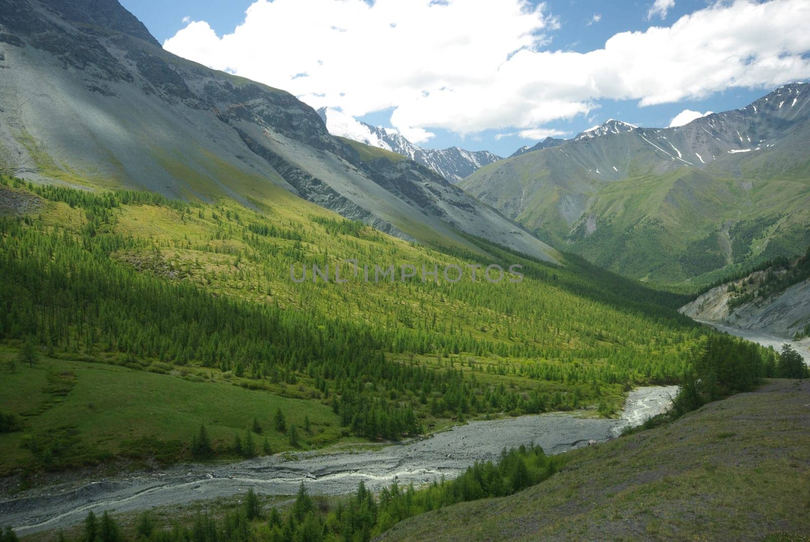 Mountain landscape. Highlands, the mountain peaks, gorges and valleys. The stones on the slopes.