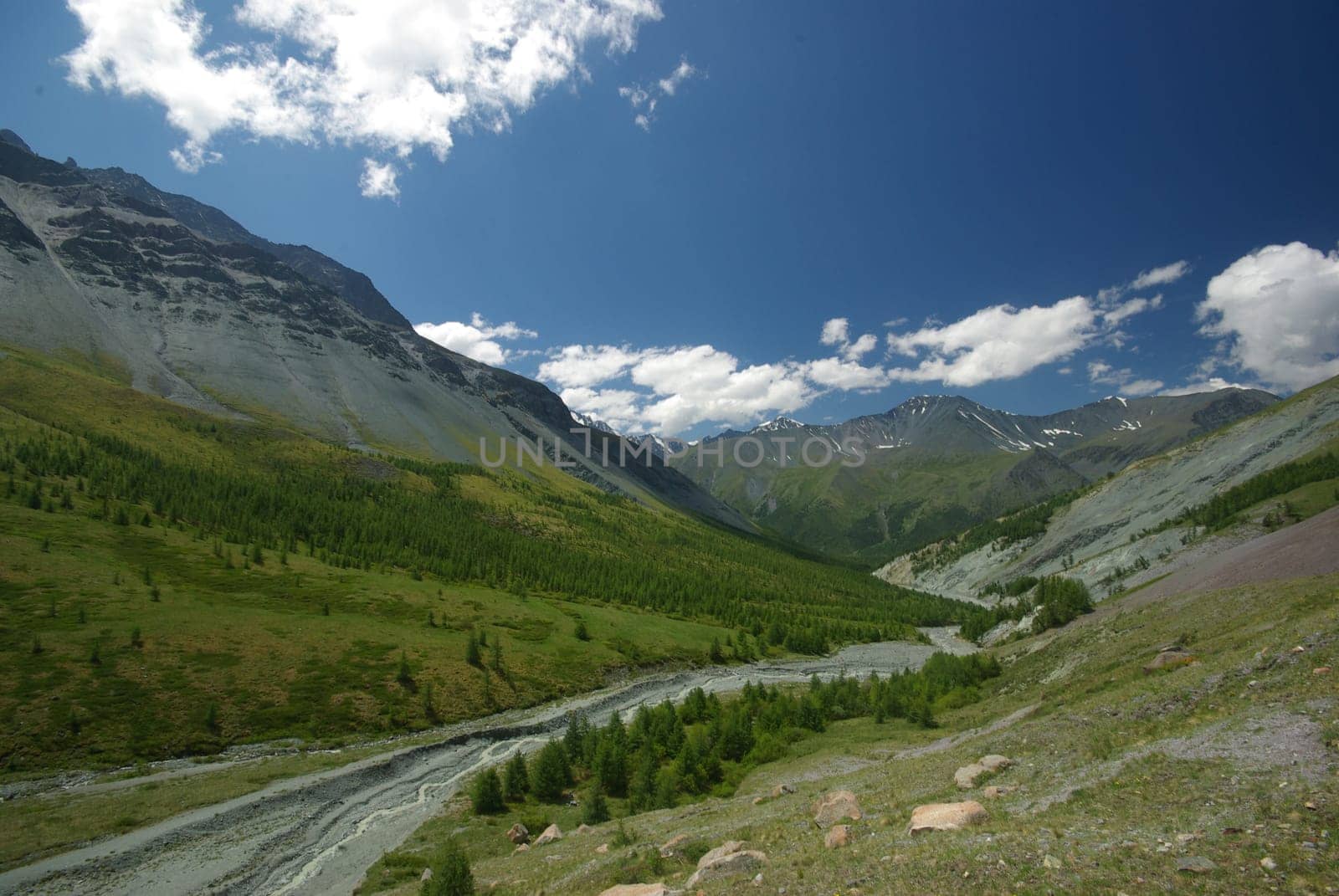 Mountain landscape. Highlands, the mountain peaks, gorges and valleys. The stones on the slopes.
