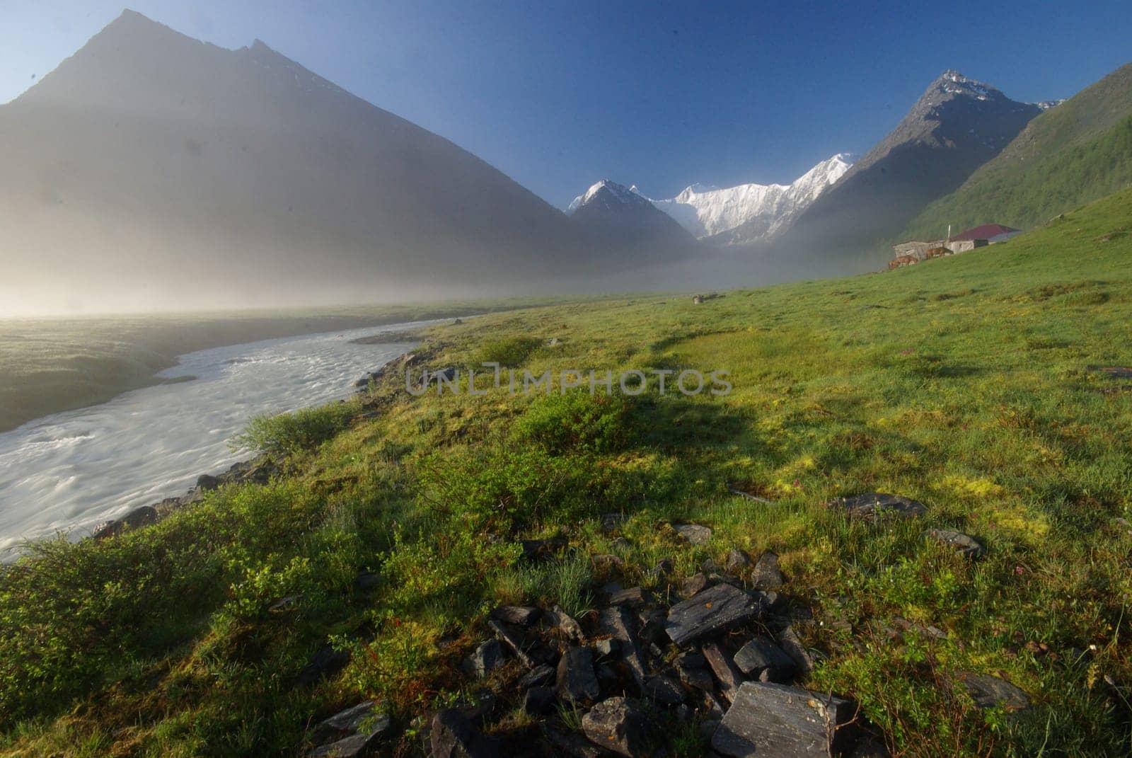 Mountain landscape. Highlands, the mountain peaks, gorges and valleys. The stones on the slopes.