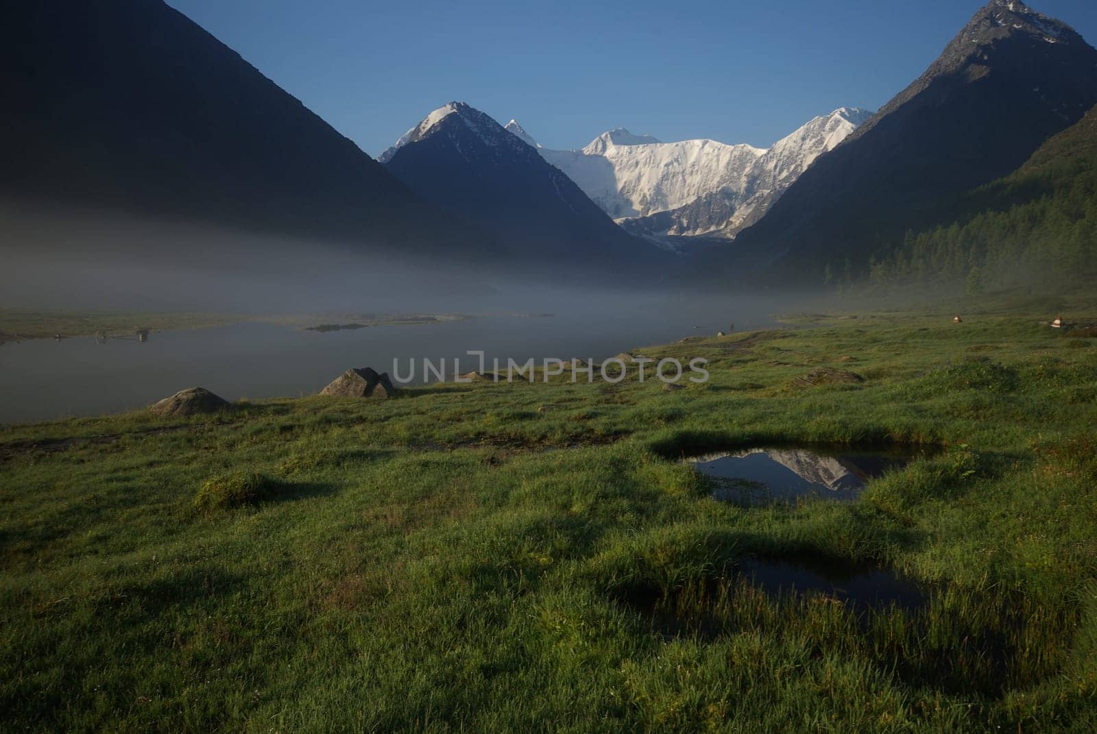 Mountain landscape. Highlands, the mountain peaks, gorges and valleys. The stones on the slopes.