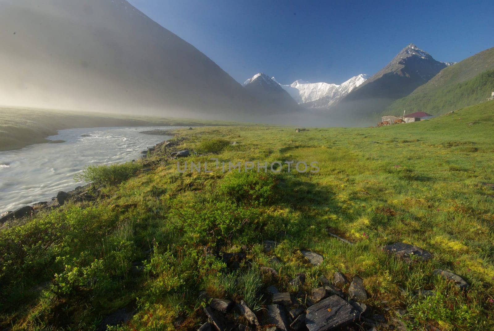 Mountain landscape. Highlands, the mountain peaks, gorges and valleys. The stones on the slopes.