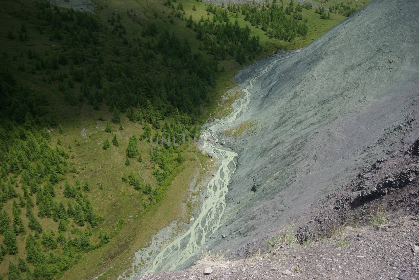 Mountain landscape. Highlands, the mountain peaks, gorges and valleys. The stones on the slopes.