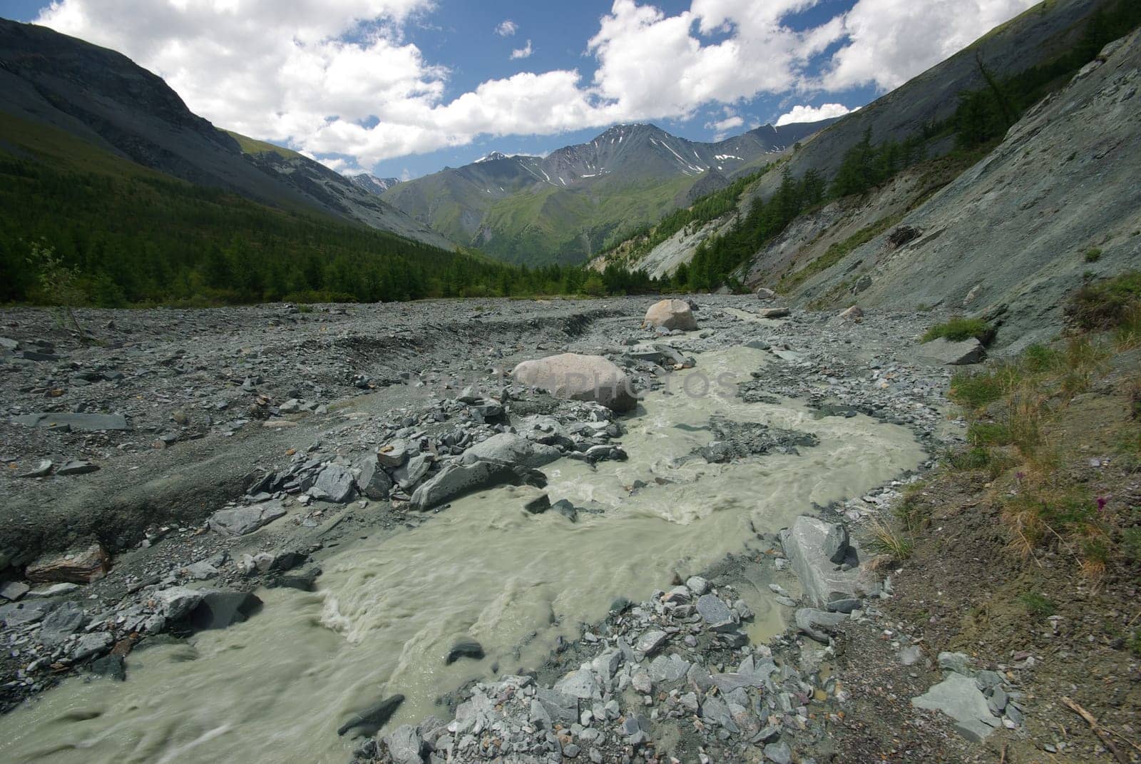 Mountain landscape. Highlands, the mountain peaks, gorges and valleys. The stones on the slopes.