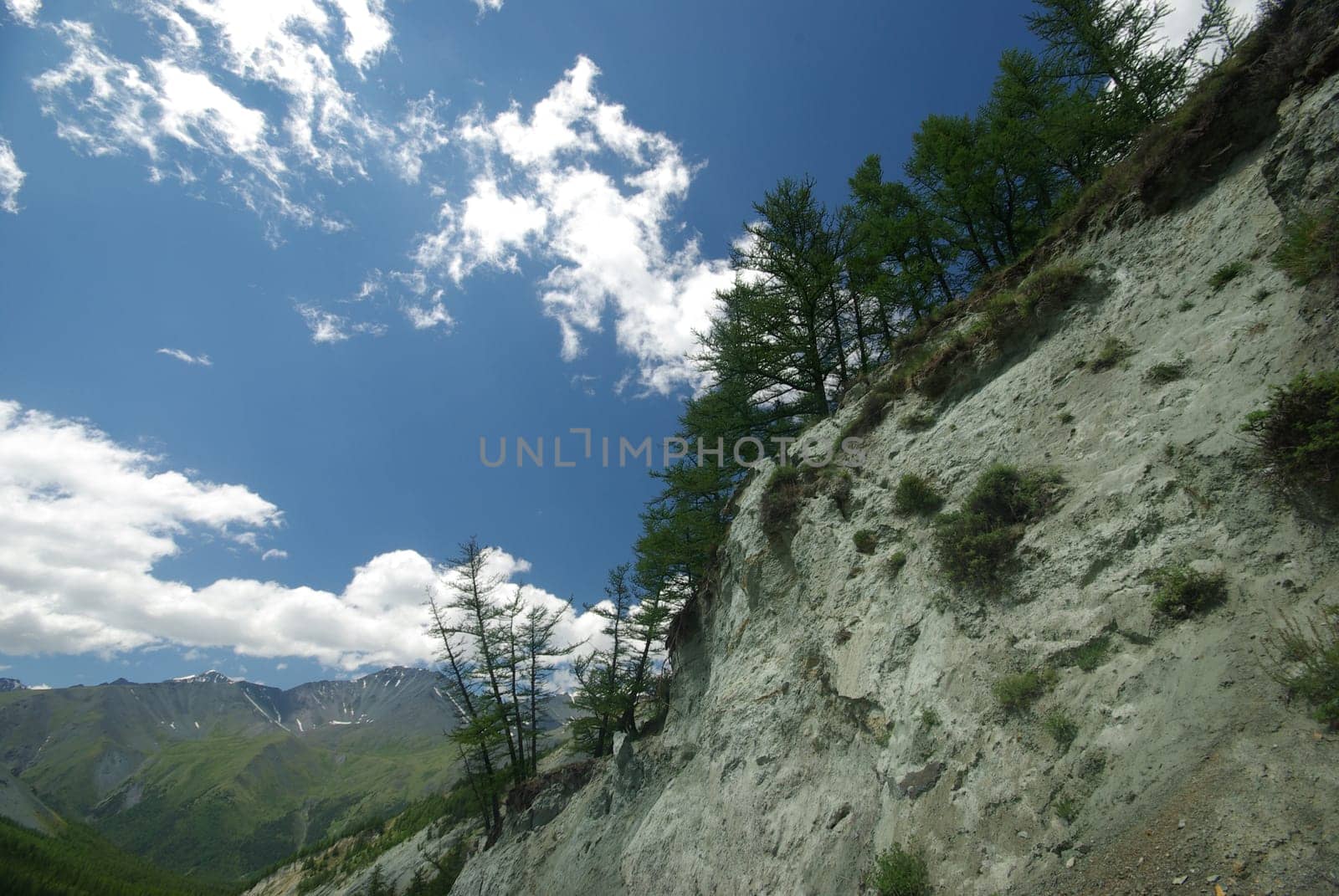 Mountain landscape. Highlands, the mountain peaks, gorges and valleys. The stones on the slopes.