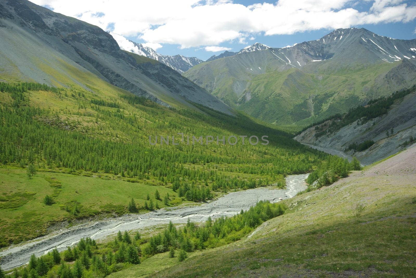 Mountain landscape. Highlands, the mountain peaks, gorges and valleys. The stones on the slopes.