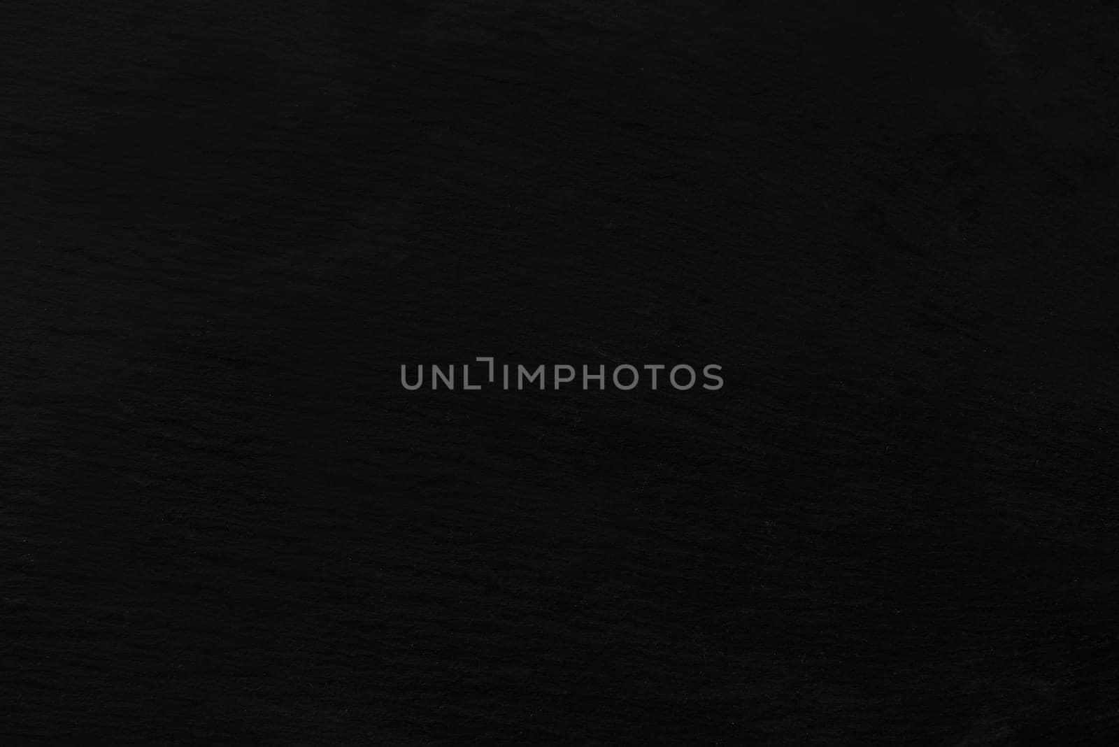 close up on a dark rock plate,background or texture