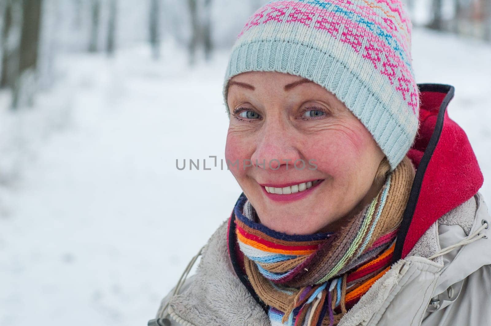 Portrait of a woman in a winter park