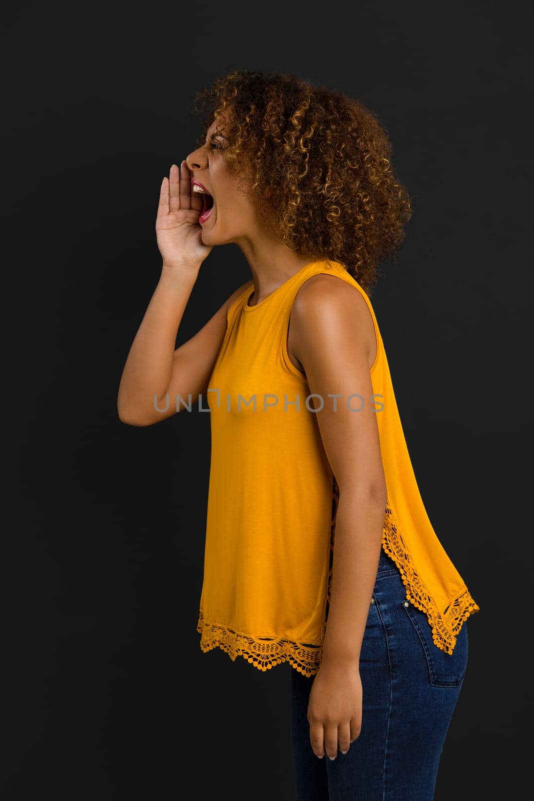 Beautiful African American woman calling someone