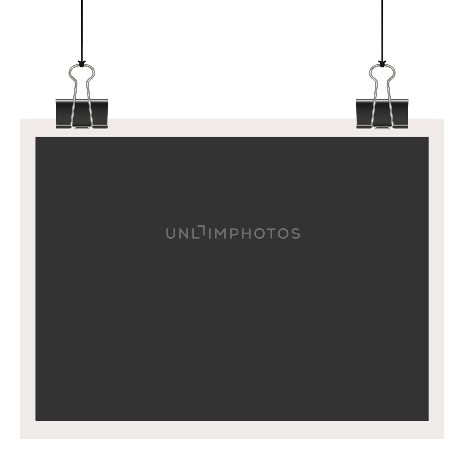 old empty photo with binder clips hanging at black twine