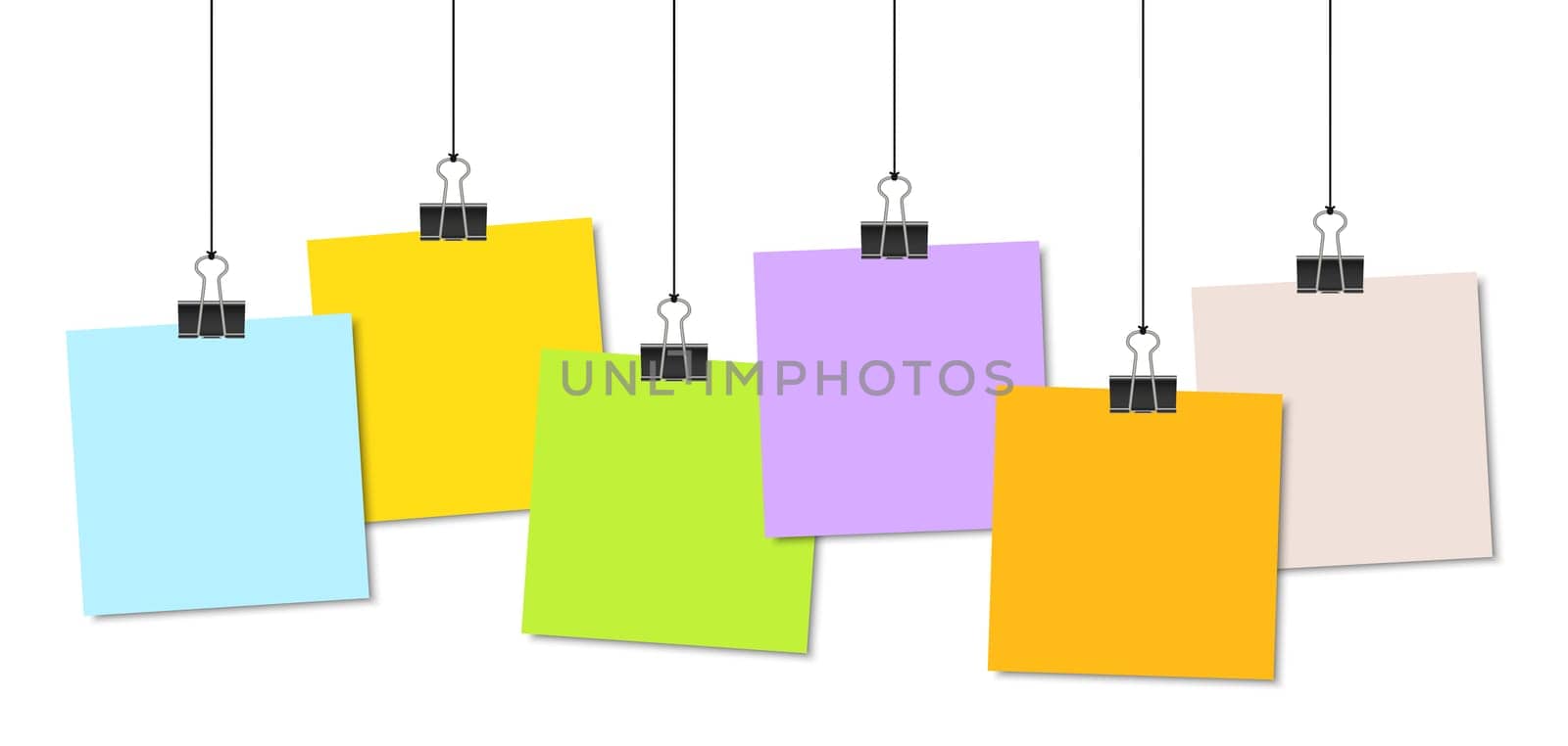 empty colored papers with binder clips hanging at black twine
