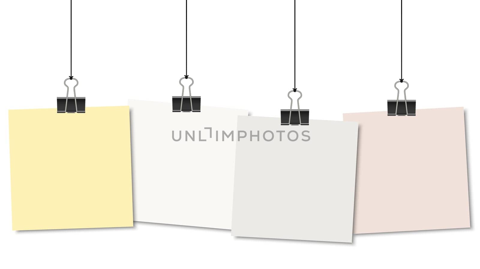 empty colored papers with binder clips hanging at black twine