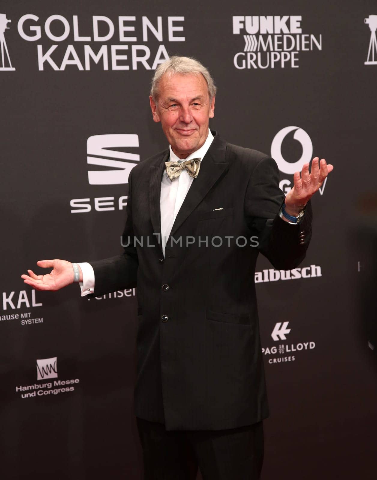 Hugo Egon Balder with girlfriend Elena.Presentation of the GOLDEN CAMERA 2017 at Messe Hamburg