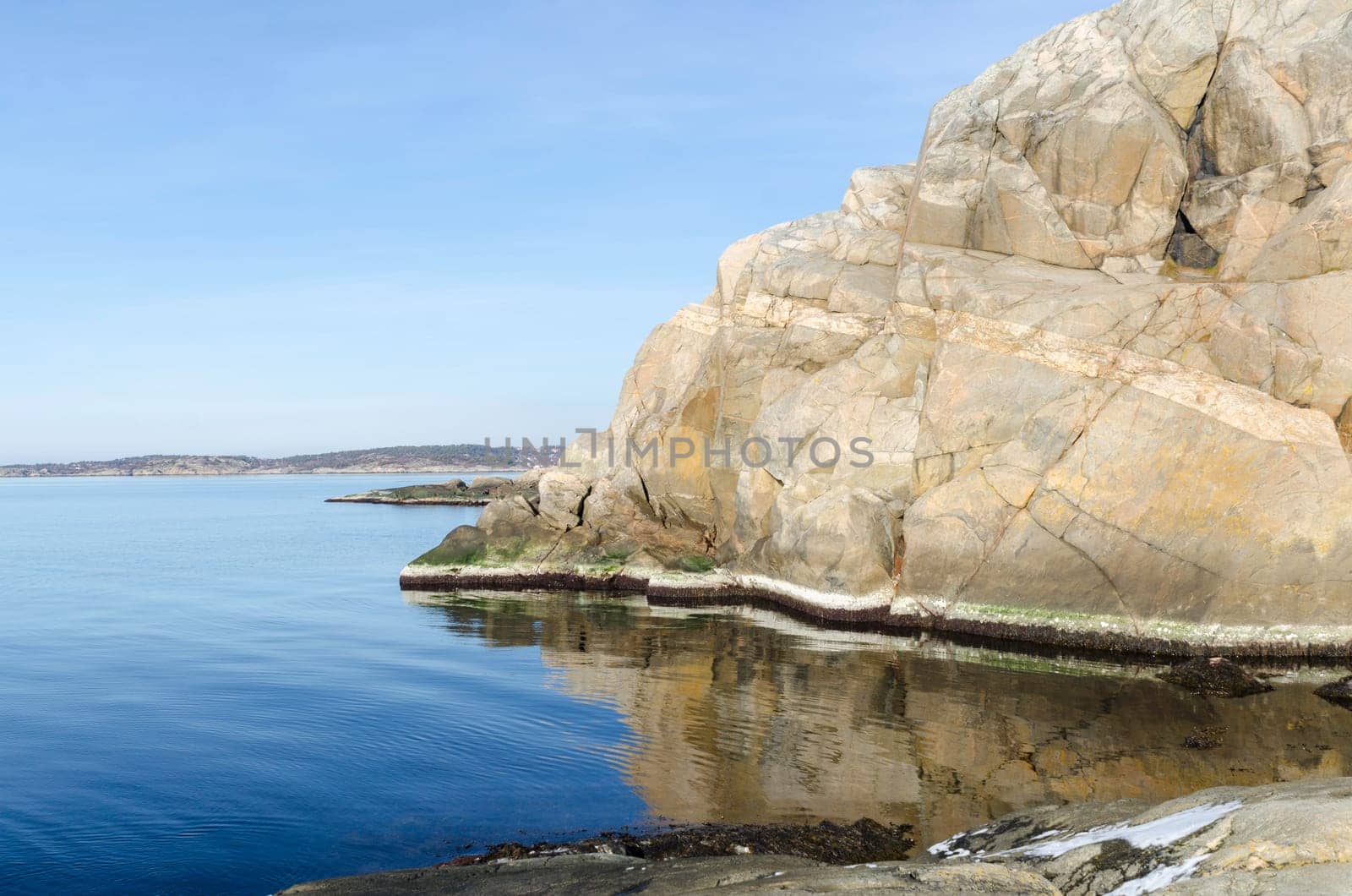 the sun is shining on the rock a winterday on swedish west-coast