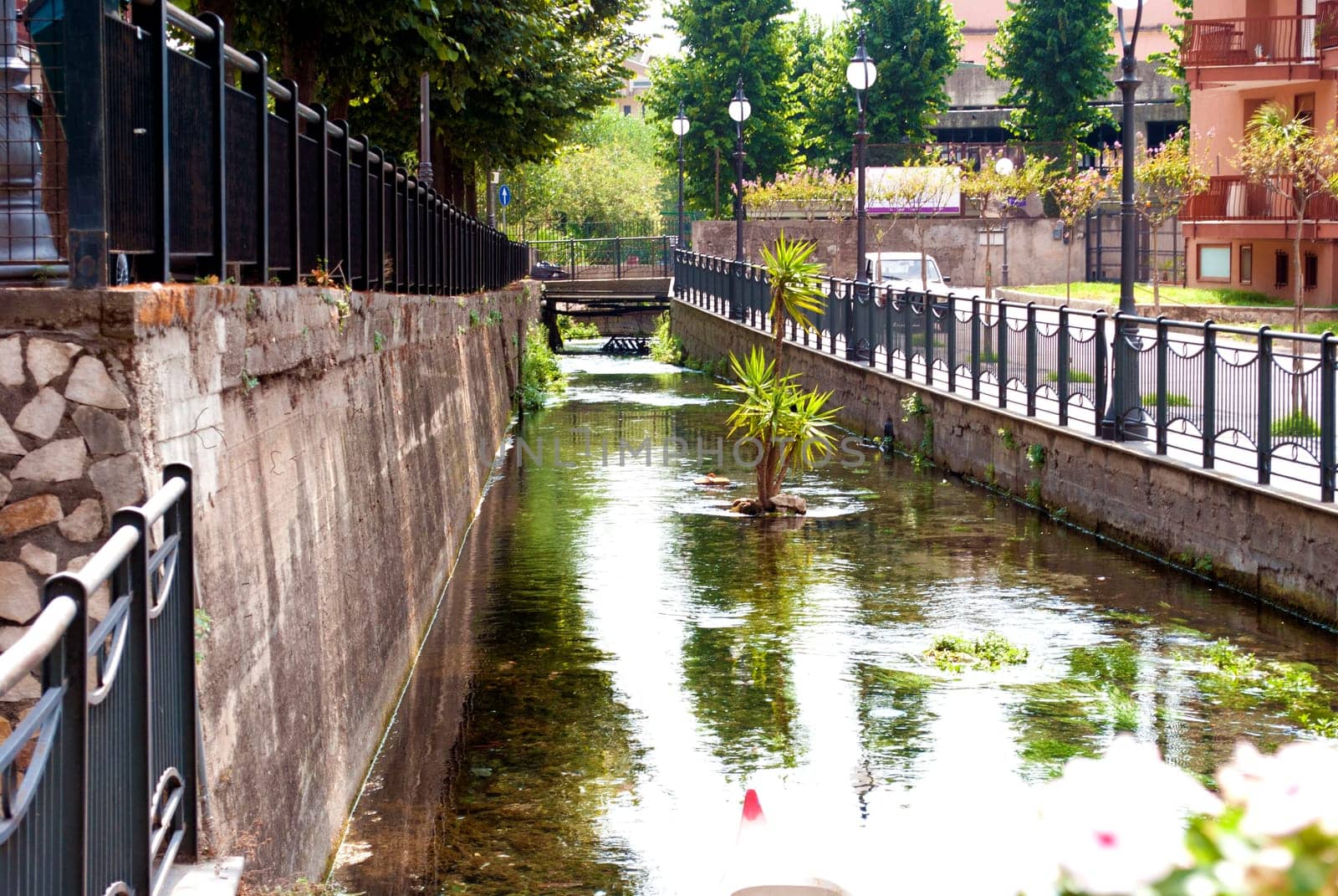 City landscape with a small river.   City of Scafati, Italy. Architecture of a small southern Italian town.