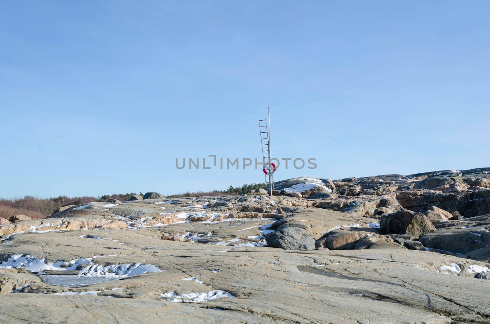 one sunny day on the swedish westcoast some snow on the rock