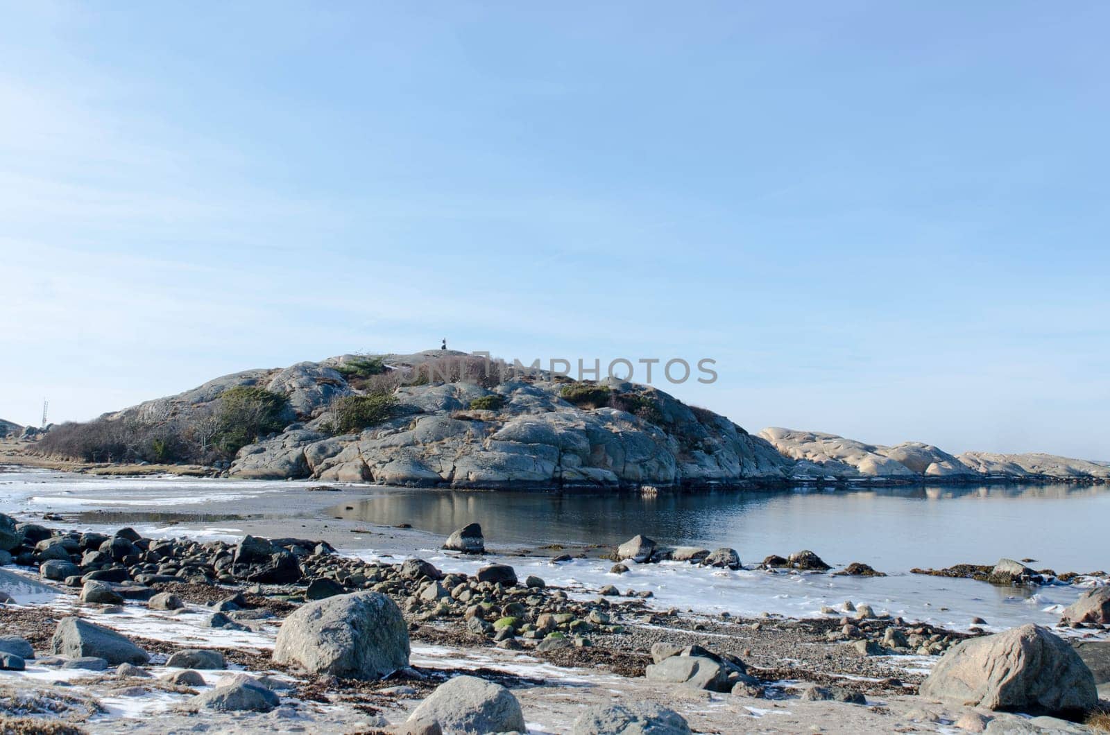 the sun is shining on the rock a winterday on swedish west-coast