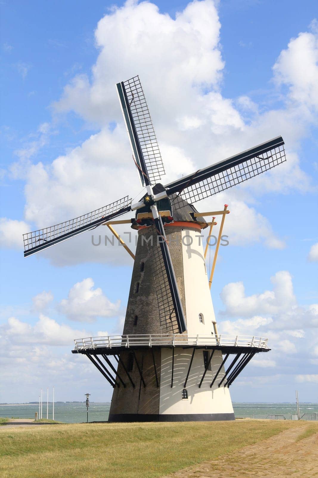 A beautiful old historic windmill,with four wings.