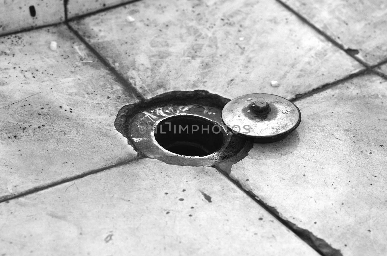 Dirty old sink in black and white theme