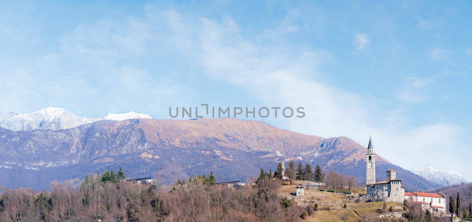 Mountain landscape with castle and belfry. Artegna , Friuli Italy