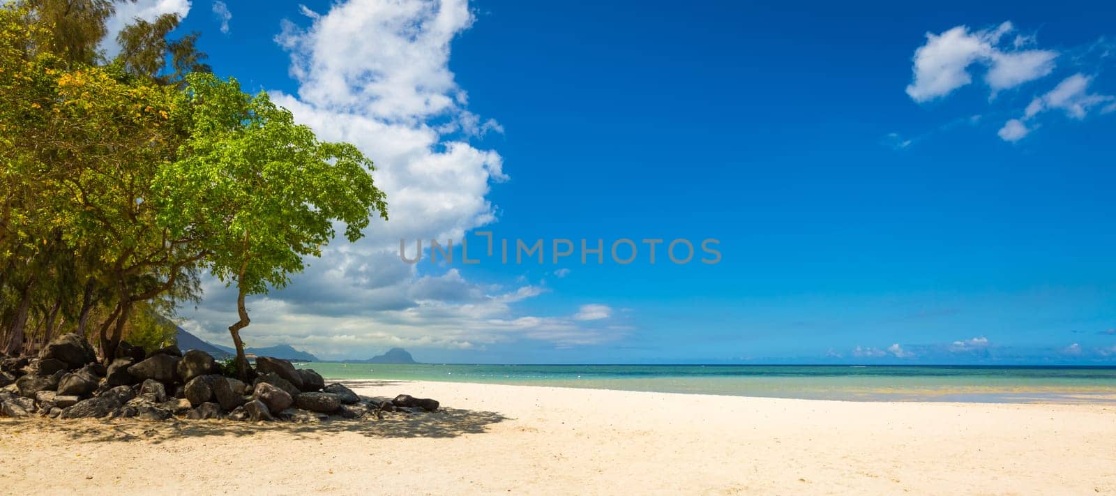 Sandy tropical Wolmar beach at sunny day. Panorama. Mauritius