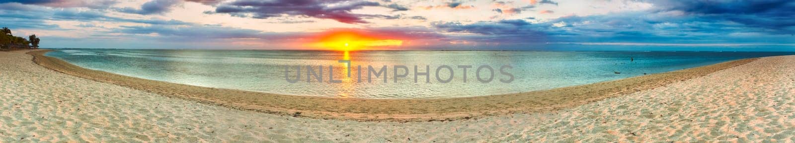 White sandy beach Le Morne at sunset. Mauritius. Panorama