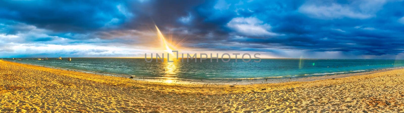 White sandy Flic en Flac beach at sunset. Mauritius. Panorama