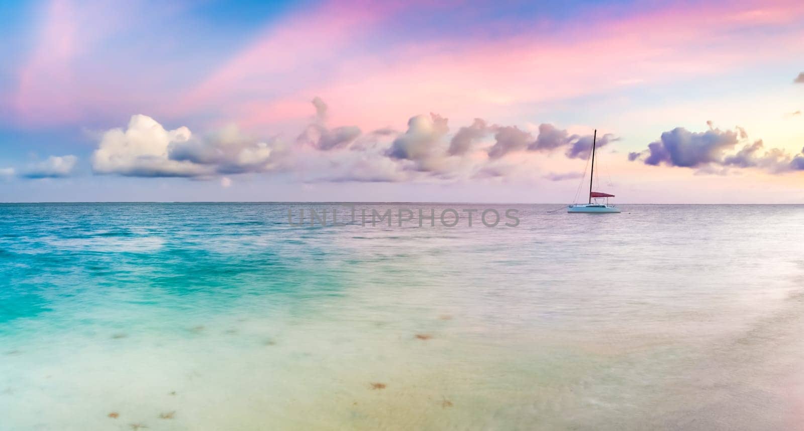 Amazing Pointe d'Esny beach on the South East Coast of Mauritius at sunset. Panorama