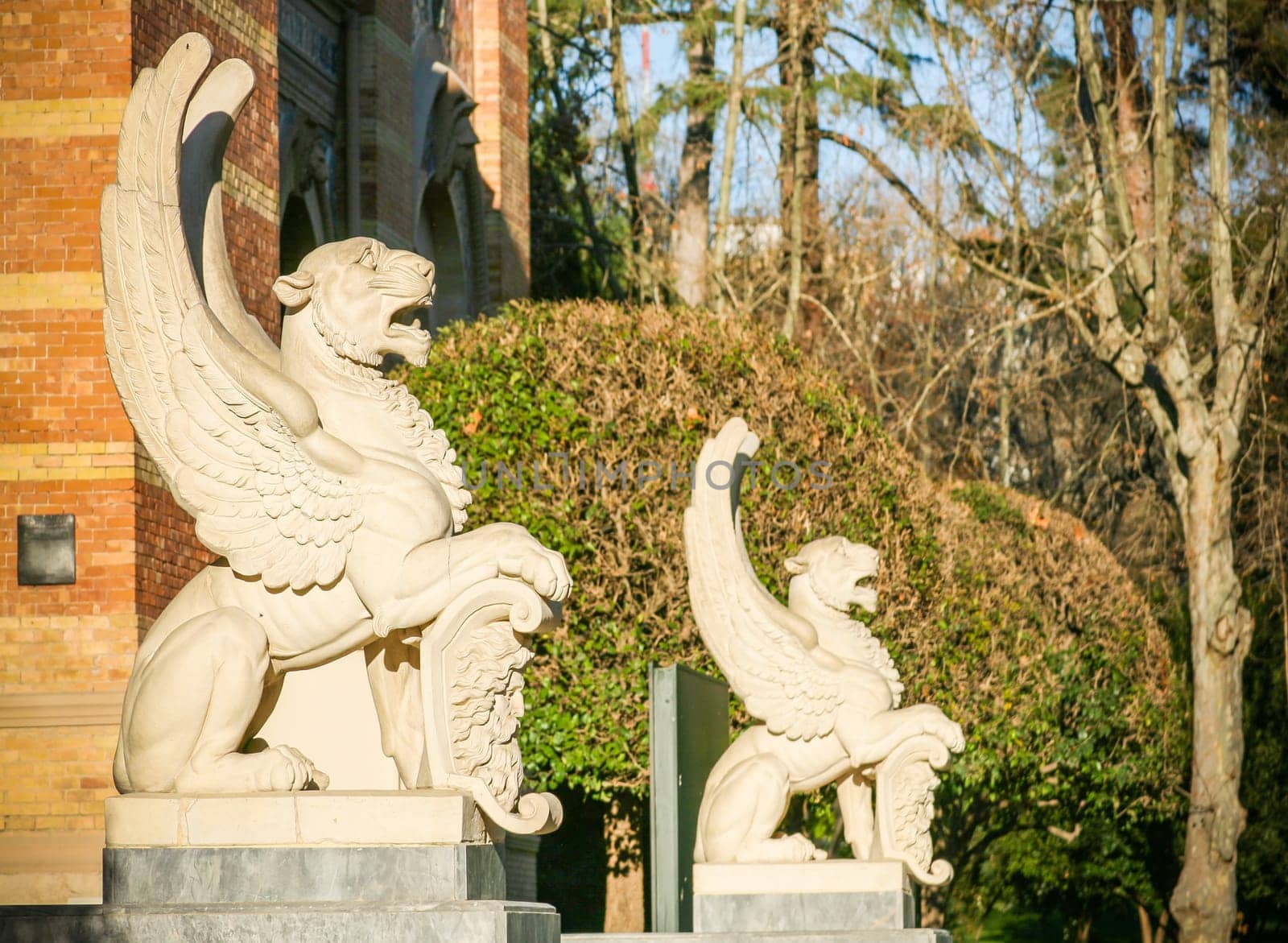 Statue of Winged tigers in city park in Madrid