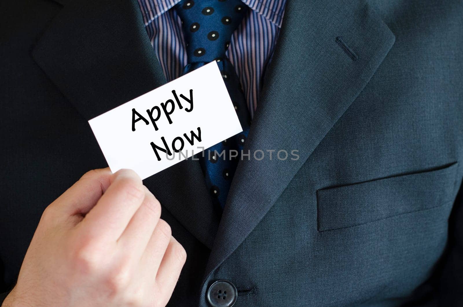 Apply now text note concept over business man background.