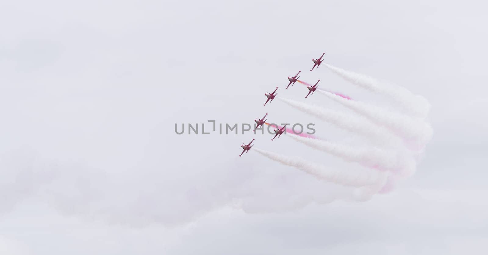LEEUWARDEN, NETHERLANDS - JUNE 6, 2016: Turkish Star air force demonstration tean performing their stunts during the Dutch Air Force open days