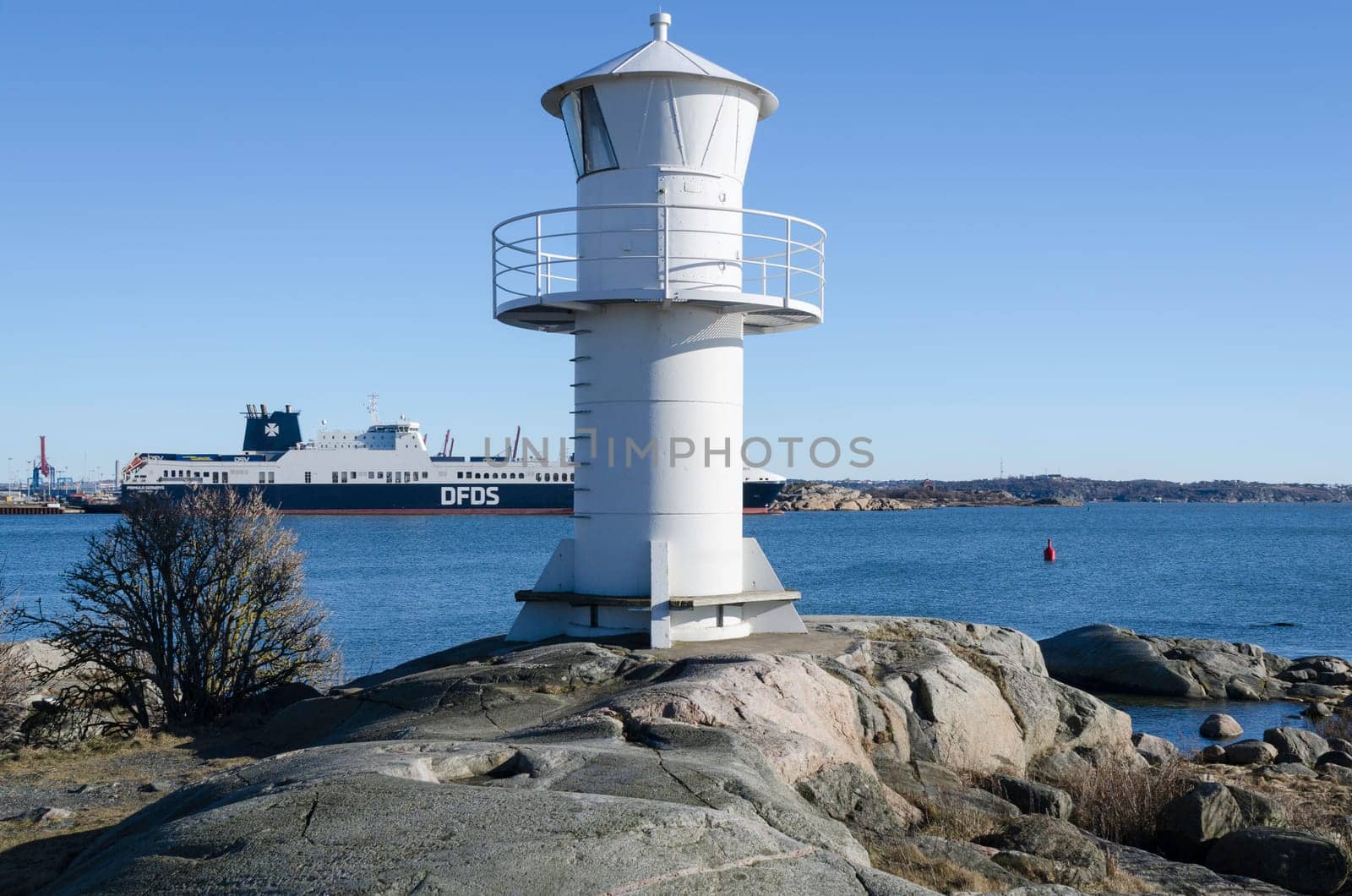 one lighthouse on sweden west-coast standing on a cliff