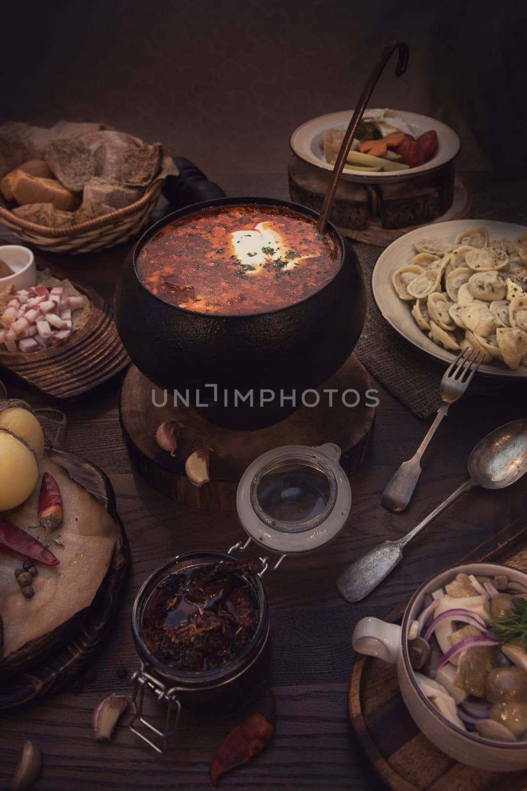 Russian food: borsch pickles cheese meat dumplings and fat