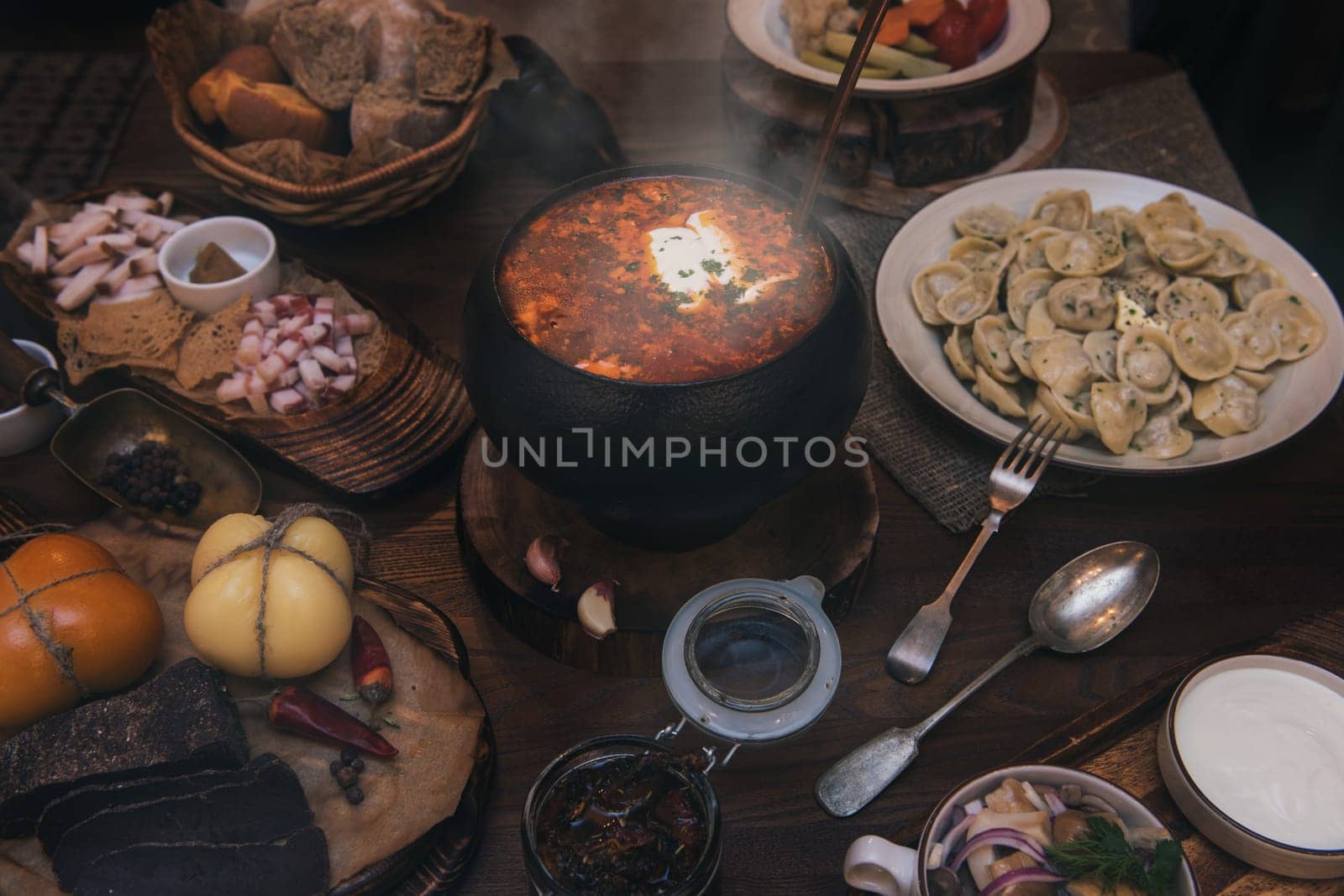 Russian food: borsch pickles cheese meat dumplings and fat