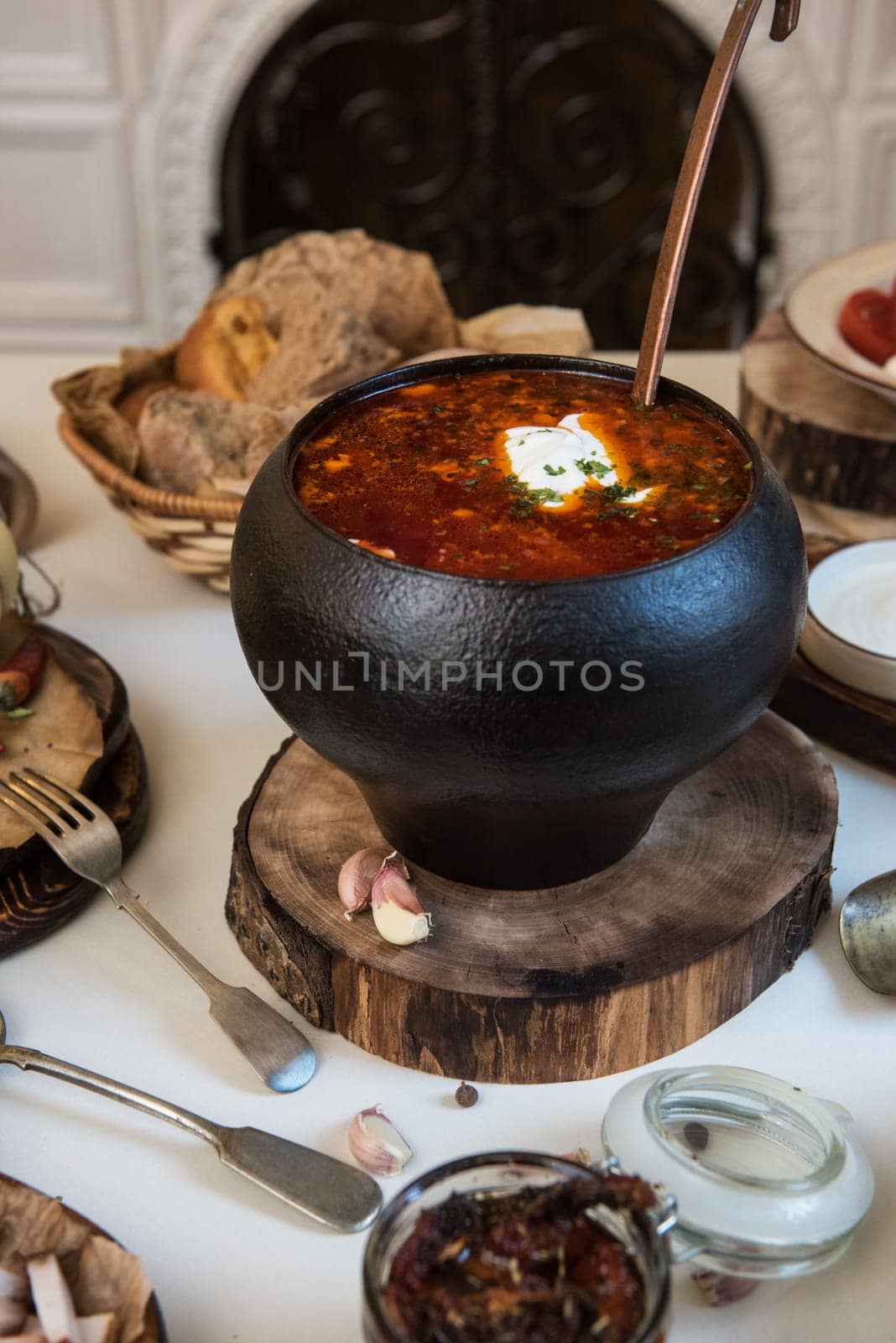 Russian borsch at pot on the table