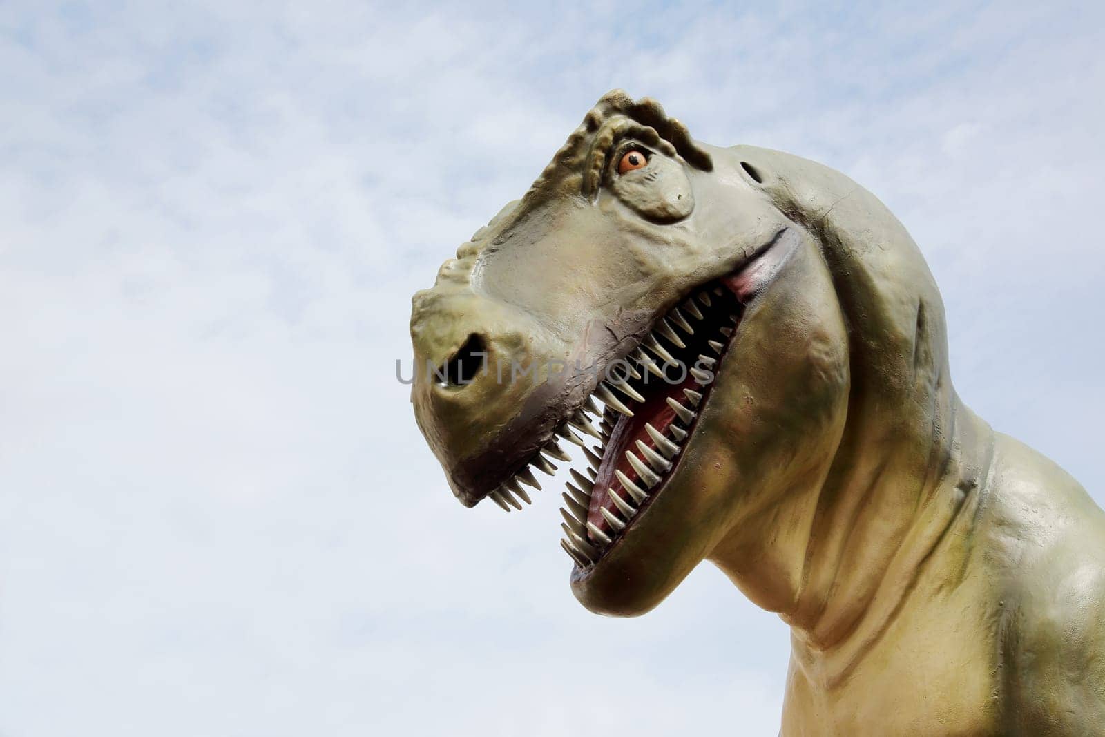 Tyrannosaurus rex dinosaur and sky background