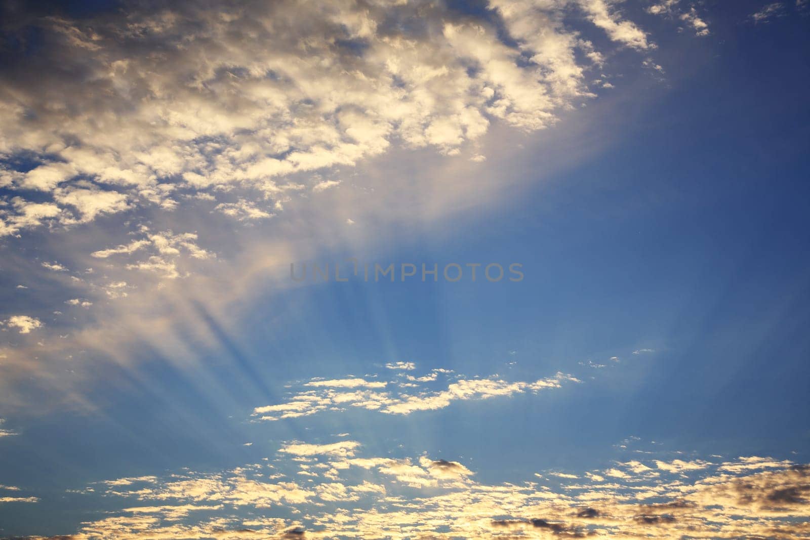 Beautiful heavenly landscape with the sun in the clouds